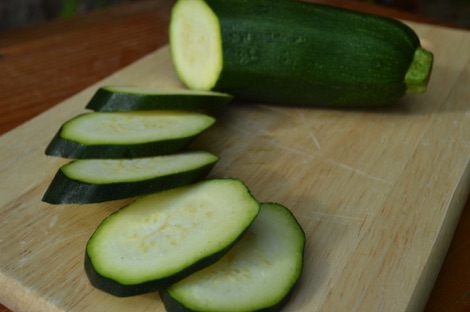 sliced courgettes on a chopping board
